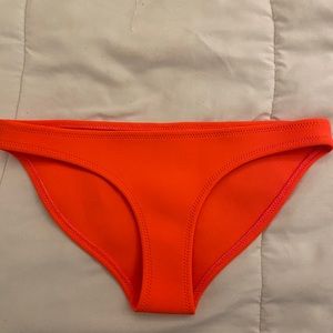 Triangl bottoms that a a neon orange.